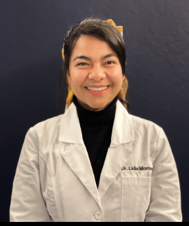 Dr. Lidia Monterroso, DDS, smiling at Muir Station Smiles dental office
