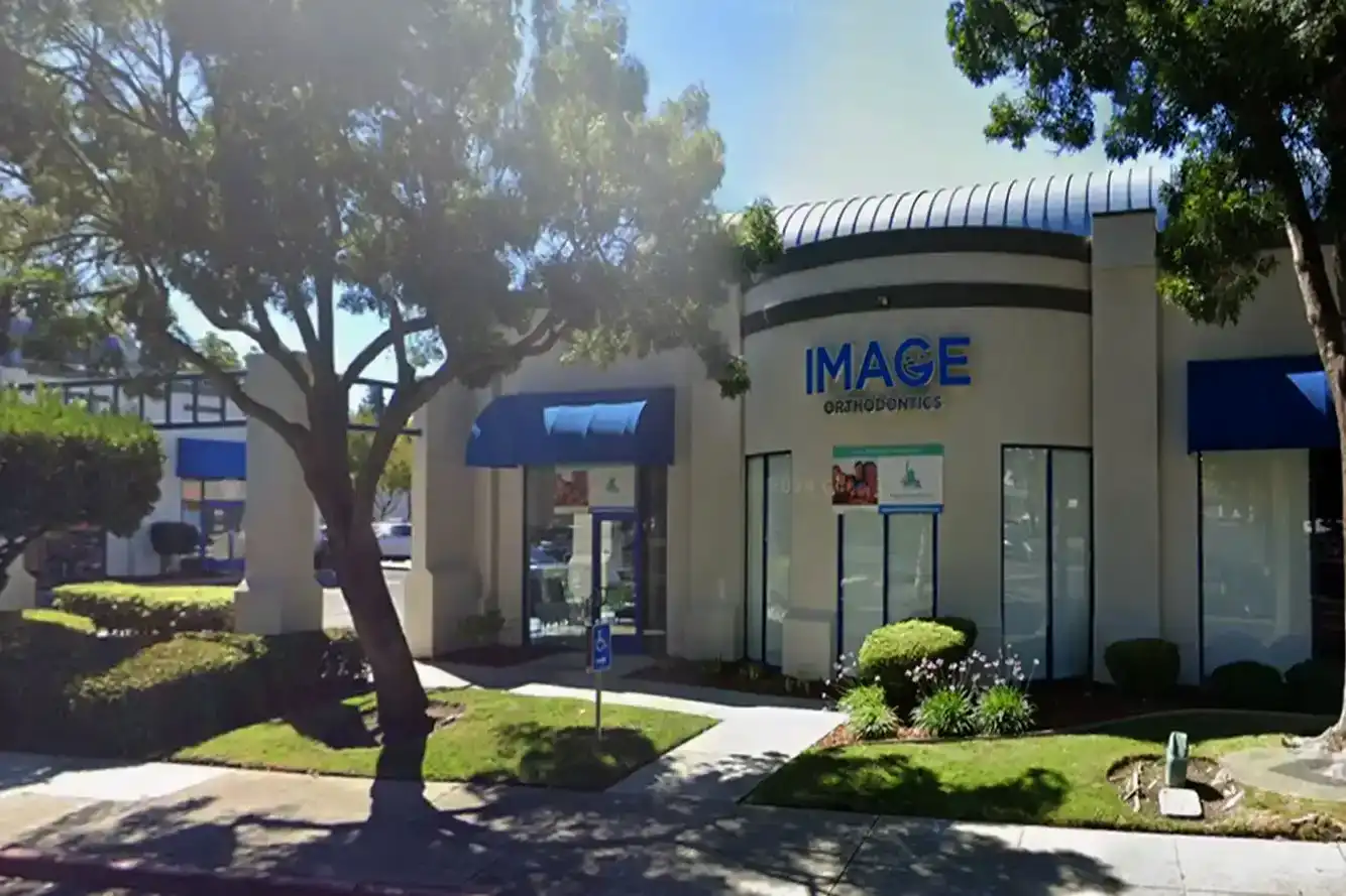 The Muir Station Smiles Concord office building, with blue awnings